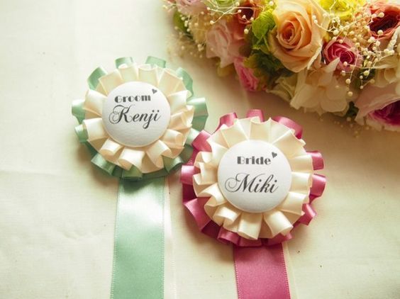 The Ultimate Must-Have Wedding Item Everyone Loves: A Collection of Cute Ways to Use Rosettes♡にて紹介している画像