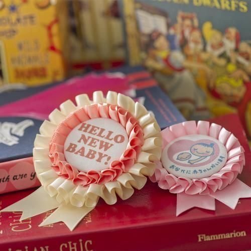 "Introducing the Adorable 'Maternity Rosette': A Heartwarming Little Gift for Expecting Moms That's Gaining Popularity!"にて紹介している画像