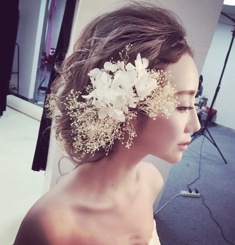 多次换发型的婚 bride：19款时尚婚礼发型参考图集♡にて紹介している画像