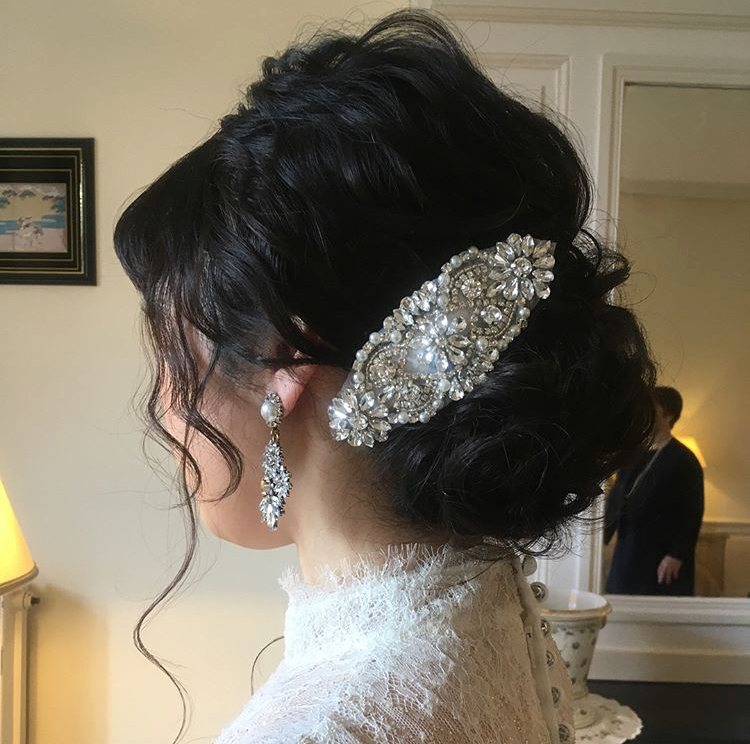 多次换发型的婚 bride：19款时尚婚礼发型参考图集♡にて紹介している画像