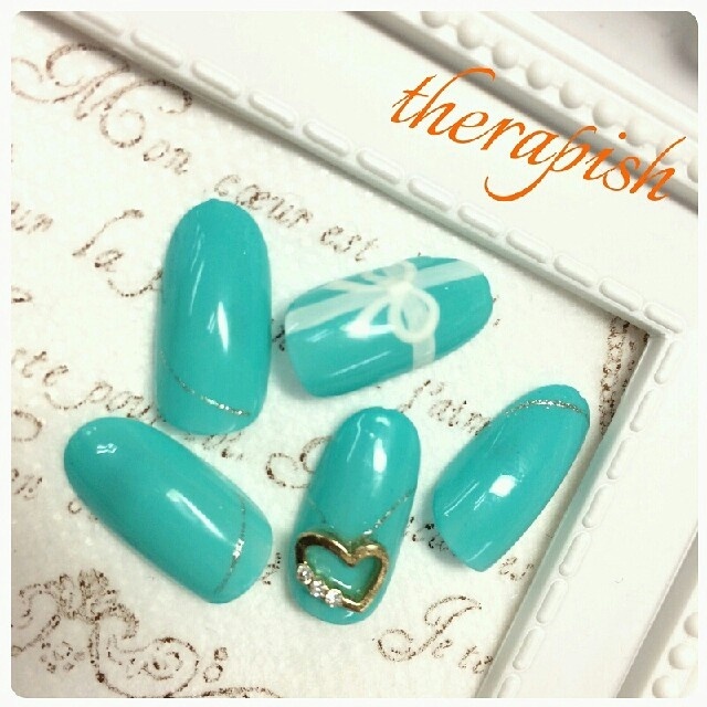 ご縁を結ぶHAPPYモチーフ♡リボンネイルで指先から幸せを呼び込もう♩にて紹介している画像