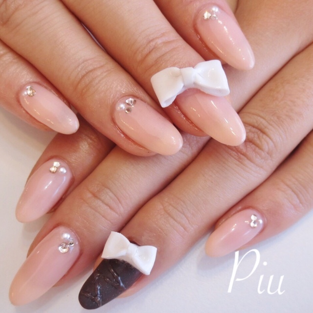 ご縁を結ぶHAPPYモチーフ♡リボンネイルで指先から幸せを呼び込もう♩にて紹介している画像