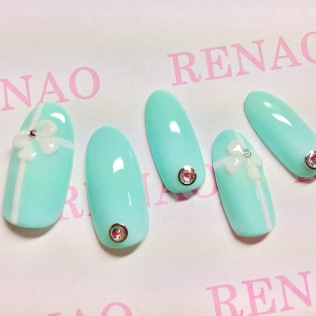 ご縁を結ぶHAPPYモチーフ♡リボンネイルで指先から幸せを呼び込もう♩にて紹介している画像