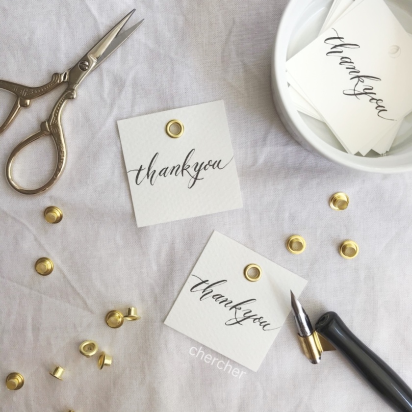 "Essential DIY Tools: The Versatile 'Eyelet Punch' for Invitations, Place Cards, and Handmade Favors"にて紹介している画像