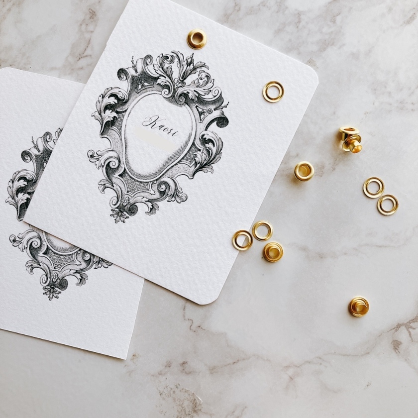 "Essential DIY Tools: The Versatile 'Eyelet Punch' for Invitations, Place Cards, and Handmade Favors"にて紹介している画像