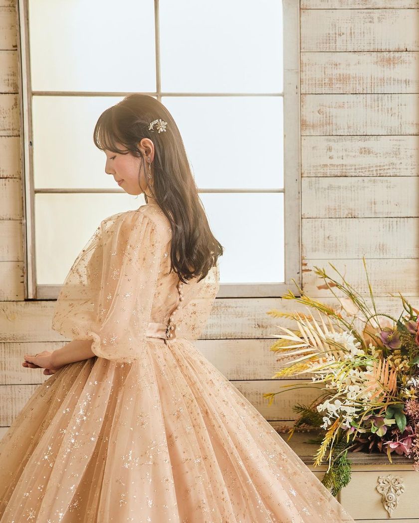 A collection of photos wearing the cute sparkly "Constellation Dress" by Marry with fluffy puff sleeves🪄🌟にて紹介している画像