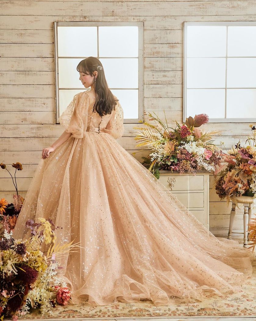 A collection of photos wearing the cute sparkly "Constellation Dress" by Marry with fluffy puff sleeves🪄🌟にて紹介している画像