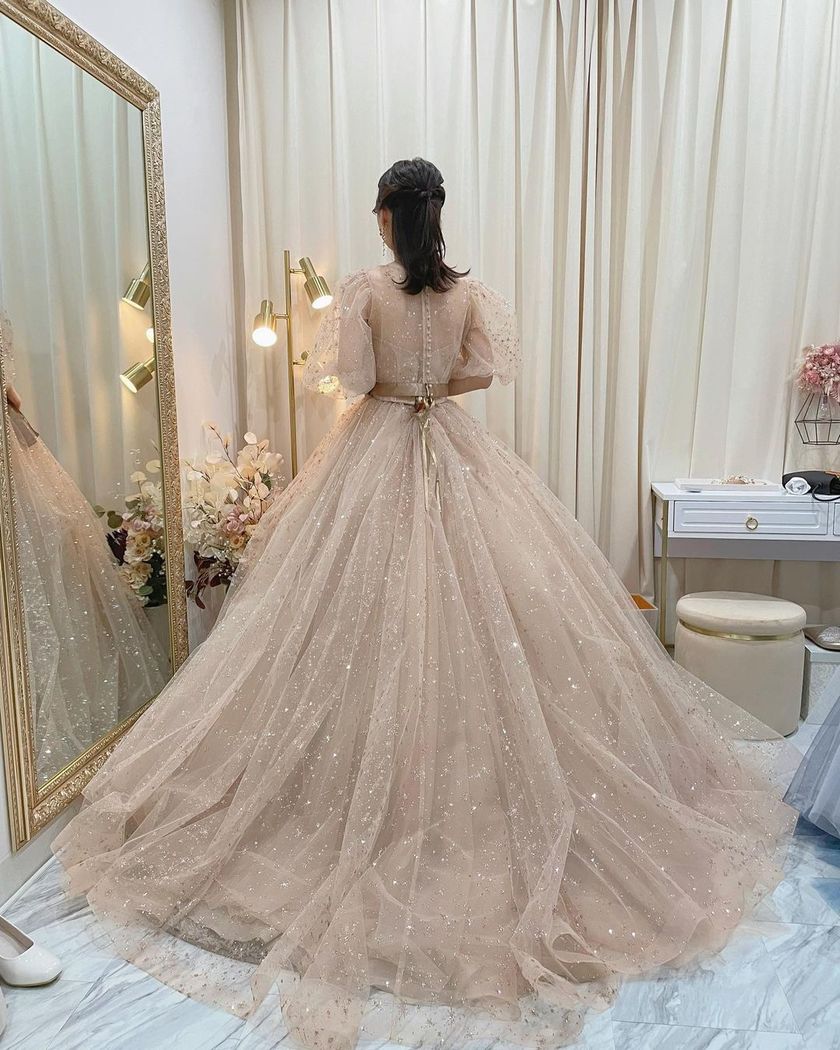 A collection of photos wearing the cute sparkly "Constellation Dress" by Marry with fluffy puff sleeves🪄🌟にて紹介している画像