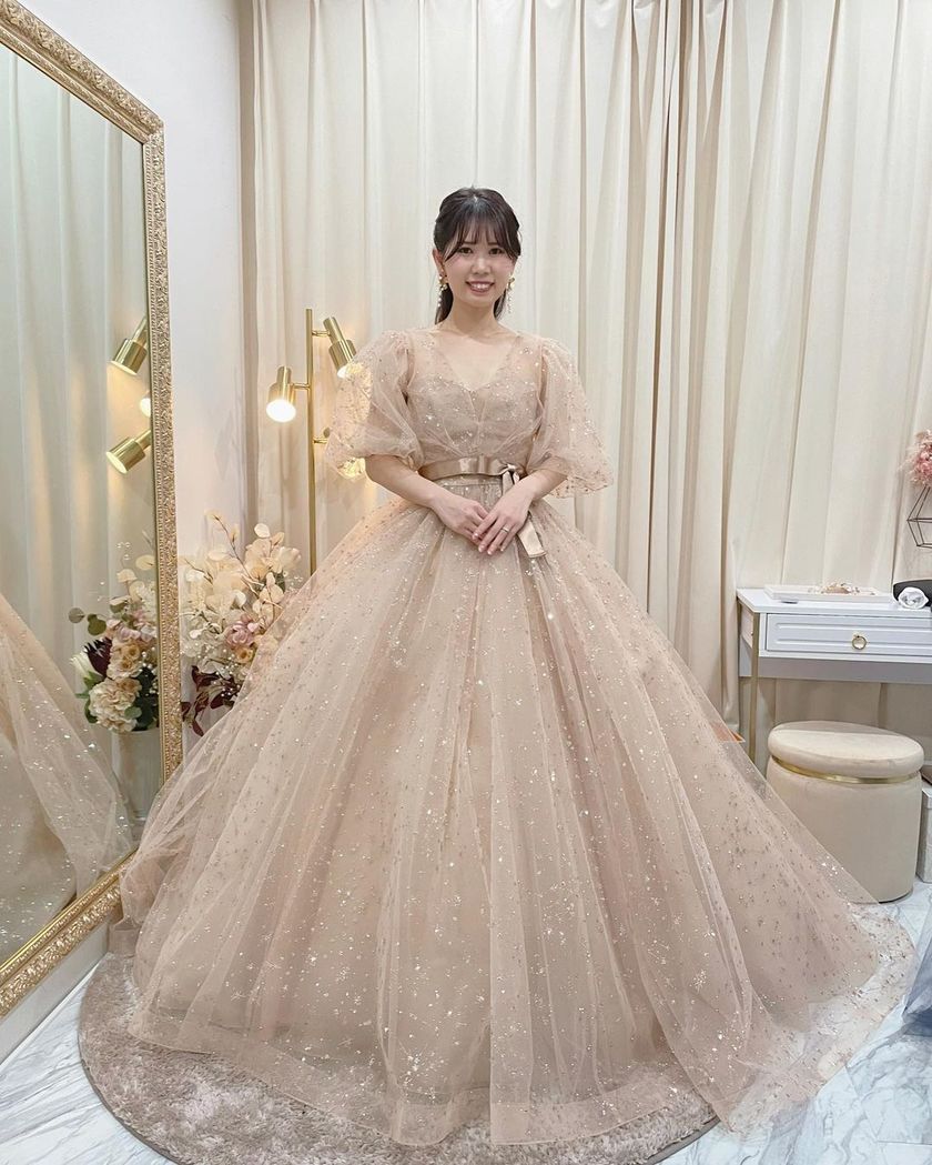 A collection of photos wearing the cute sparkly "Constellation Dress" by Marry with fluffy puff sleeves🪄🌟にて紹介している画像