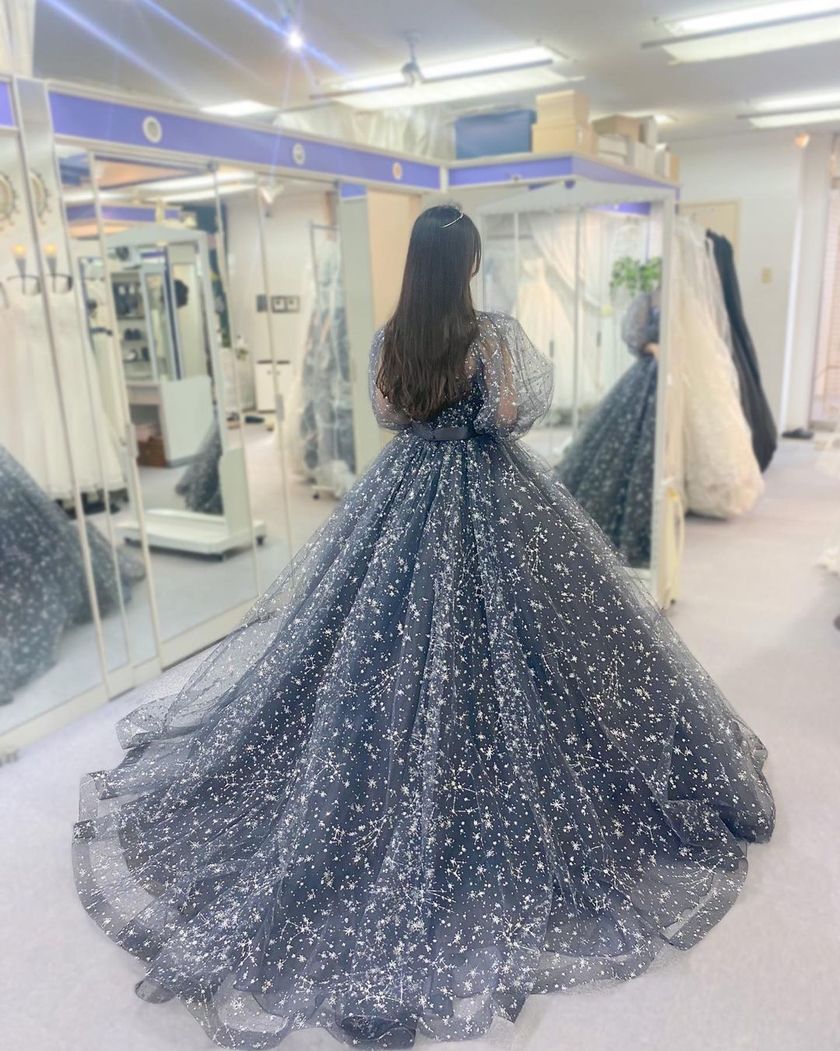 A collection of photos wearing the cute sparkly "Constellation Dress" by Marry with fluffy puff sleeves🪄🌟にて紹介している画像
