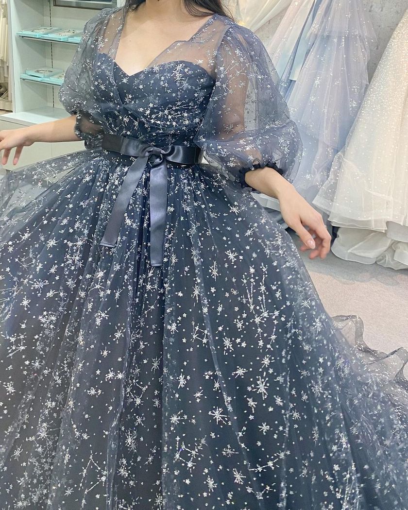 A collection of photos wearing the cute sparkly "Constellation Dress" by Marry with fluffy puff sleeves🪄🌟にて紹介している画像