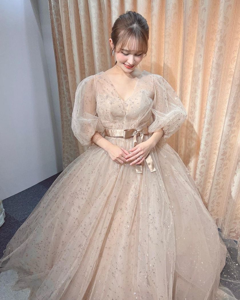 A collection of photos wearing the cute sparkly "Constellation Dress" by Marry with fluffy puff sleeves🪄🌟にて紹介している画像