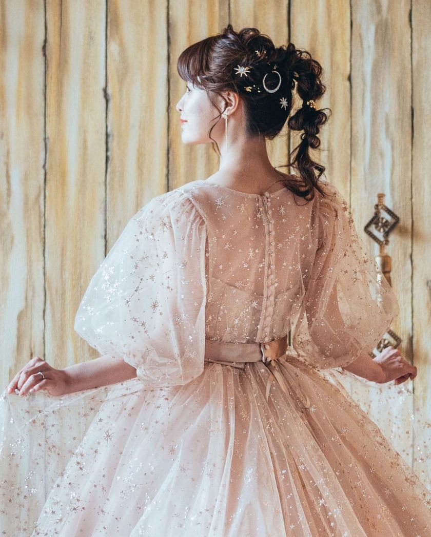 A collection of photos wearing the cute sparkly "Constellation Dress" by Marry with fluffy puff sleeves🪄🌟にて紹介している画像