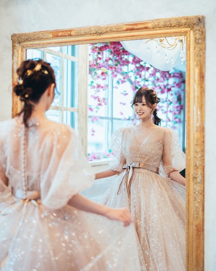 A collection of photos wearing the cute sparkly "Constellation Dress" by Marry with fluffy puff sleeves🪄🌟にて紹介している画像