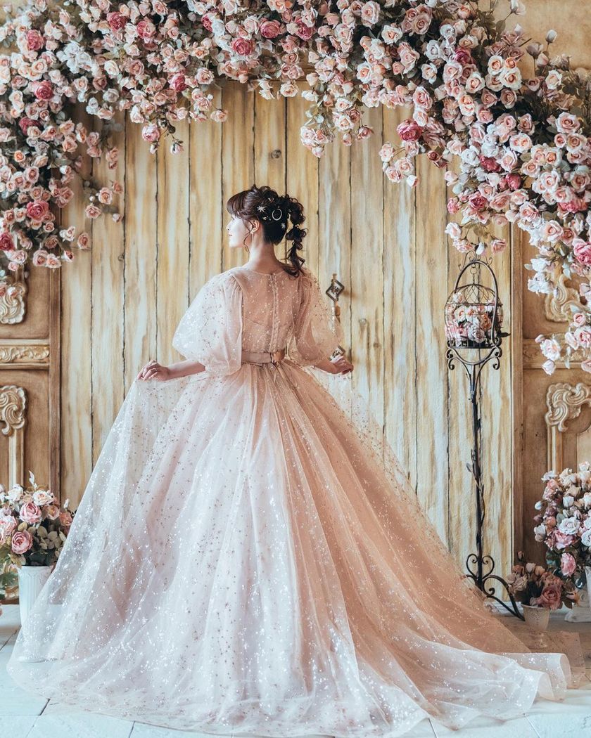 A collection of photos wearing the cute sparkly "Constellation Dress" by Marry with fluffy puff sleeves🪄🌟にて紹介している画像