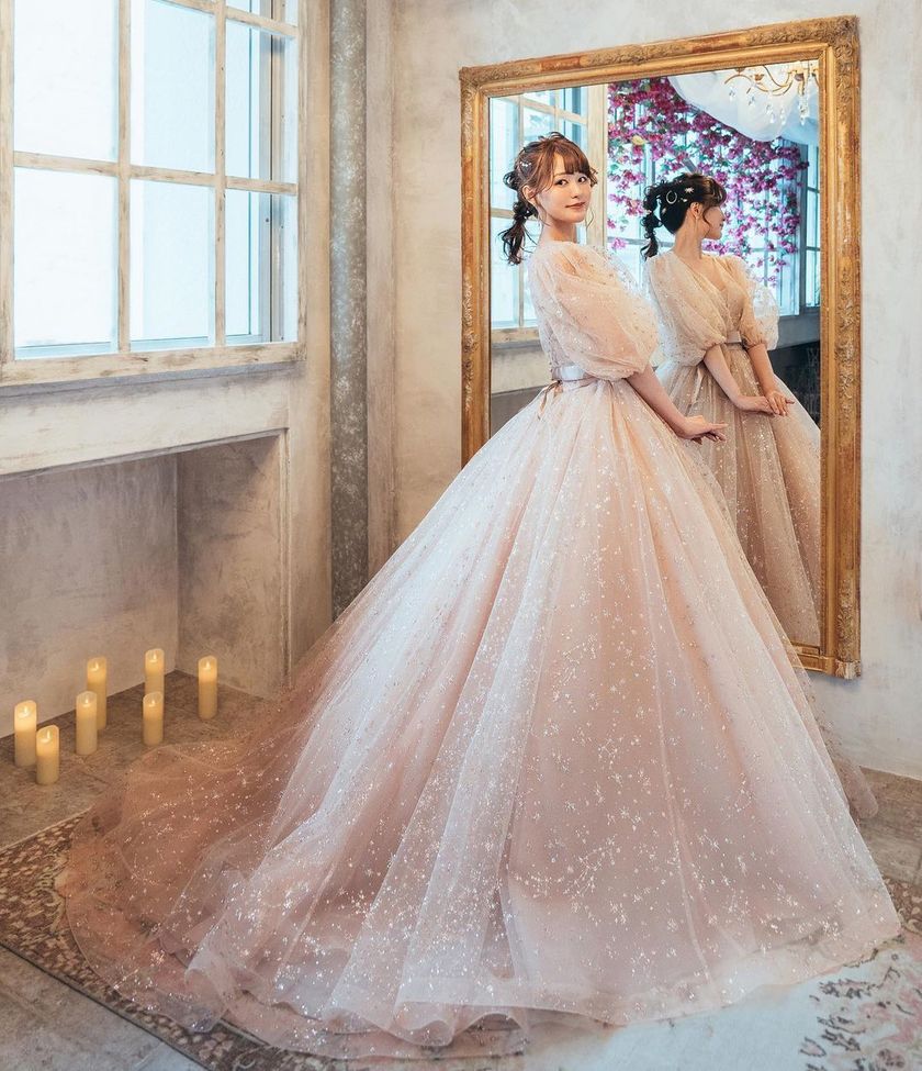 A collection of photos wearing the cute sparkly "Constellation Dress" by Marry with fluffy puff sleeves🪄🌟にて紹介している画像