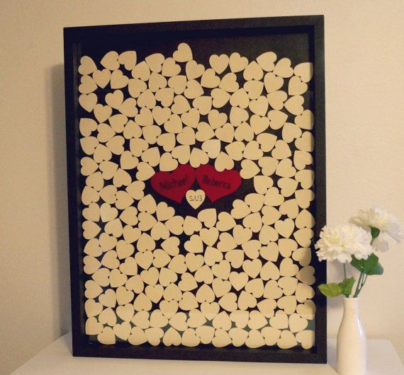 Capture Your Guests' Hearts: A Collection of Stylish Guest Book Design Ideas ♩にて紹介している画像